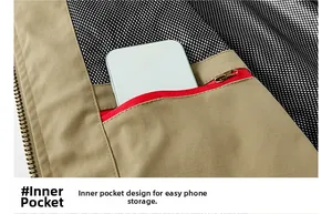 Detail view of khaki jacket interior featuring a red zipper inner pocket for phone storage