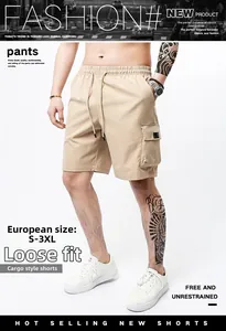 Detail view of khaki cargo shorts featuring elastic drawstring waist and side flap pockets