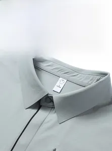 Detail of the ice-silk polo shirt collar featuring seamless one-piece craft and snap button