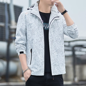 Men's lightweight hooded windbreaker with tropical leaf print and waterproof fabric
