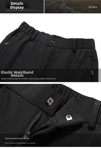 Vue détaillée de la taille élastique avec crochet métallique sur le pantalon de sport noir