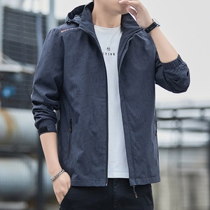 Men's lightweight hooded windbreaker with tropical leaf patterns and orange sport accents