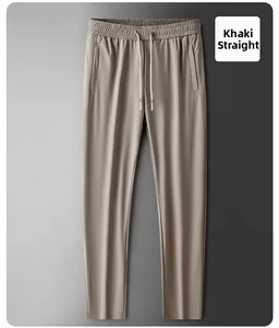 Detail view of khaki ice silk trousers showing elastic drawstring waist and fabric texture