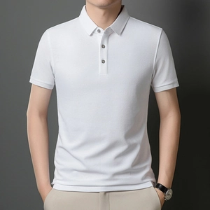 Detail shot of men's white polo shirt featuring a classic collar and fine cotton texture