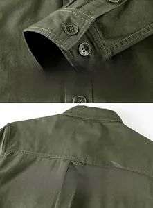 Detail of olive green cargo shirt showing metal buttons and back hanging loop