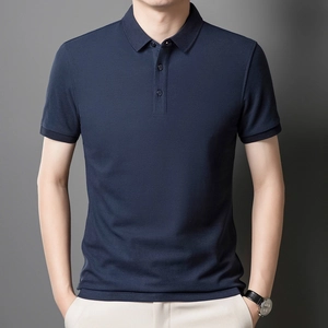 Detail of navy men polo shirt collar with three-button placket and pique cotton fabric