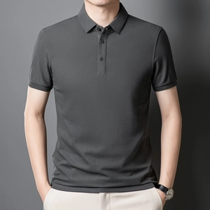 Detail of mercerized cotton polo shirt in dark grey with ribbed cuffs and polo collar