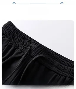 Close-up of elastic waistband with drawstring on men's ice silk trousers