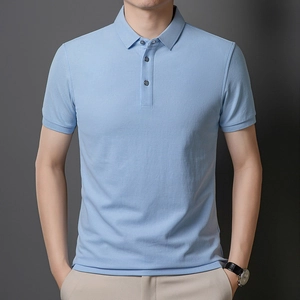 Close-up of light blue polo shirt collar featuring classic buttons and mercerized cotton fabric