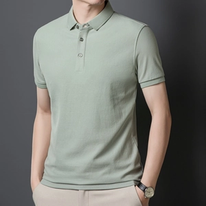 Detailed view of light green Polo shirt featuring a classic collar and three buttons