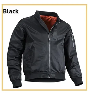 Close-up of classic black bomber jacket with orange lining and utility arm pocket