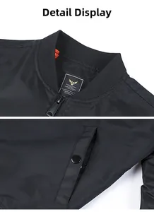 Detail of MA-1 bomber jacket showing ribbed collar, metal zipper and orange lining