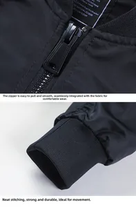 Gros plan détaillé de la fermeture éclair et des poignets côtelés d'un blouson aviateur noir