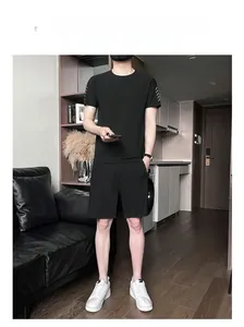 Detailed view of black men's ice silk quick-dry sports set with white sleeve stripes