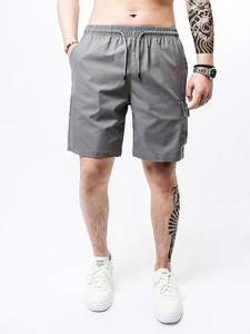 Men's dark grey cargo shorts with elastic drawstring waist and side flap pockets