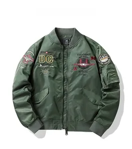 Detailed view of army green MA-1 bomber jacket featuring tactical military embroidery patches