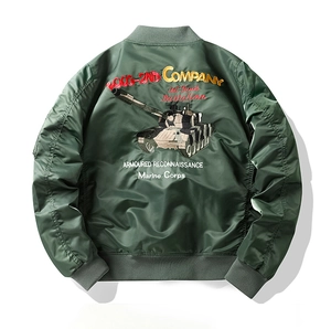 Detailed back view of army green flight jacket with tank embroidery and military text