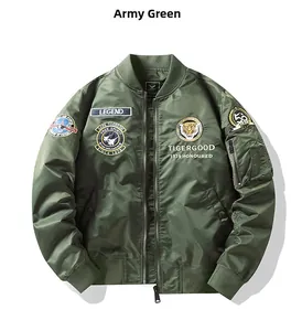 Close-up of army green pilot jacket featuring tiger embroidery and utility sleeve pocket