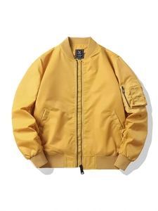 Classic bright yellow MA-1 flight bomber jacket with ribbed trim and utility sleeve pocket