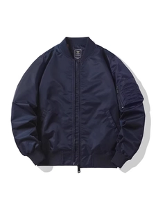 Classic navy blue MA1 bomber jacket with ribbed collar and utility sleeve pocket