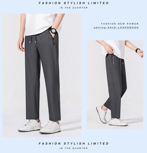 Detailed view of quick-dry charcoal grey ice silk trousers with secure zipper pockets