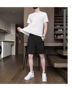 Detail showing high-elasticity ice silk fabric stretch on white summer sports t-shirt