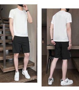 Front and back view of men's quick-dry sports set with white t-shirt and black shorts