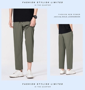Vue avant et arrière du pantalon en soie glacée vert olive avec taille élastique