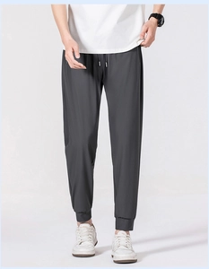 Detail of men's quick-dry ice silk pants featuring drawstring elastic waist and ribbed cuffs
