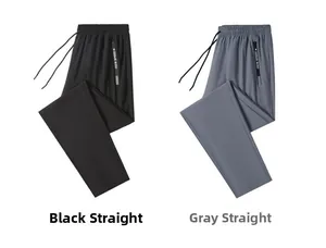 Detail view of elastic waistband with drawstring and zippered pockets on ice silk pants