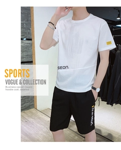 Close-up of white ice silk t-shirt and black shorts set with Seon print and yellow labels