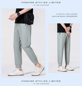 Men's light cyan ice silk trousers with drawstring waist and breathable fabric detail