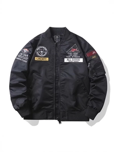 Men's black embroidered bomber jacket with pilot patches and ribbed cuffs on white background