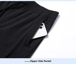 Détail de la poche zippée cachée et de la taille élastique de ce pantalon en soie glacée