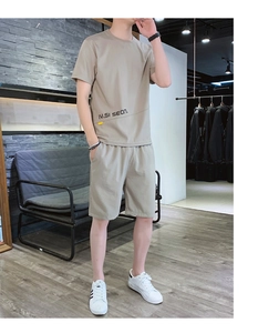 Detail of khaki ice silk summer set featuring T-shirt with IV.SI SEON lettering and shorts