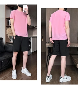 Front and back views of men's pink short-sleeve sports T-shirt and black shorts set