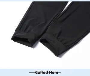 Detail of elastic cuffed leg openings on black quick-dry breathable ice silk pants