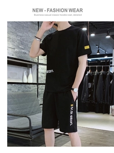 Close-up of black ice silk t-shirt with SEON print and matching casual shorts
