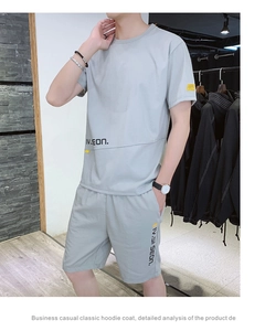 Detail view of ice silk grey summer t-shirt and shorts set with decorative labels