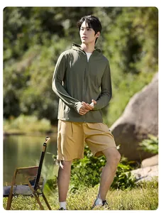 Outdoor hooded sun protection jacket in dark green with thumb holes and breathable fabric