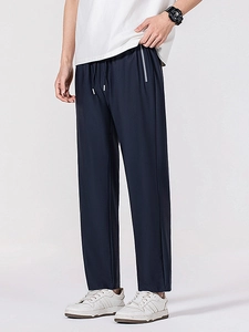 Men's quick-dry ice silk trousers in navy blue with elastic waist and white drawstrings