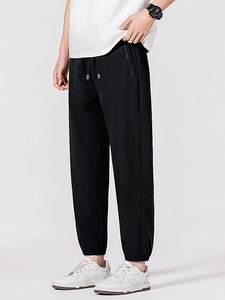 Men's loose fit ice silk casual pants with elastic drawstring waist and side zipper pockets