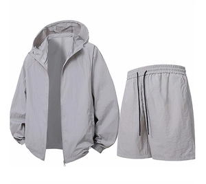 Detail view of light grey sun protection hoodie and matching shorts set with drawstrings