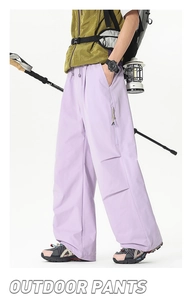 Détail du pantalon outdoor lavande avec taille à cordon réglable et tissu coupe-vent