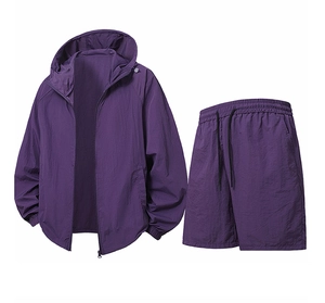 Detail of men's dark purple UV protection set showing hooded jacket and shorts texture