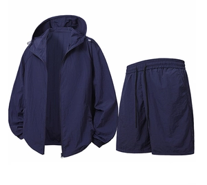 Detailed view of lightweight navy blue sun protection jacket and drawstring shorts set