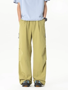 Pantalon cargo vintage vert moutarde à jambe large, coupe droite et détails plissés