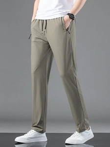 Men's ice silk summer casual pants in olive green with drawstring and zipper pockets