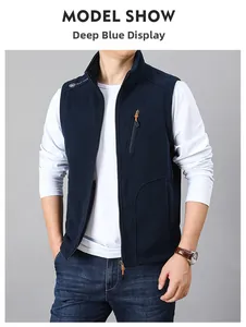 Detail of dark blue men's fleece vest featuring vertical chest zipper and stand collar