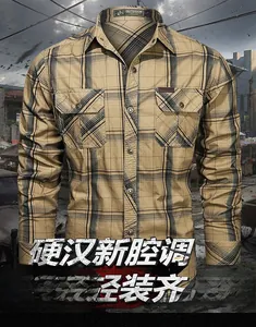 Detailed close-up of khaki plaid cotton shirt featuring double chest pockets and brand logo